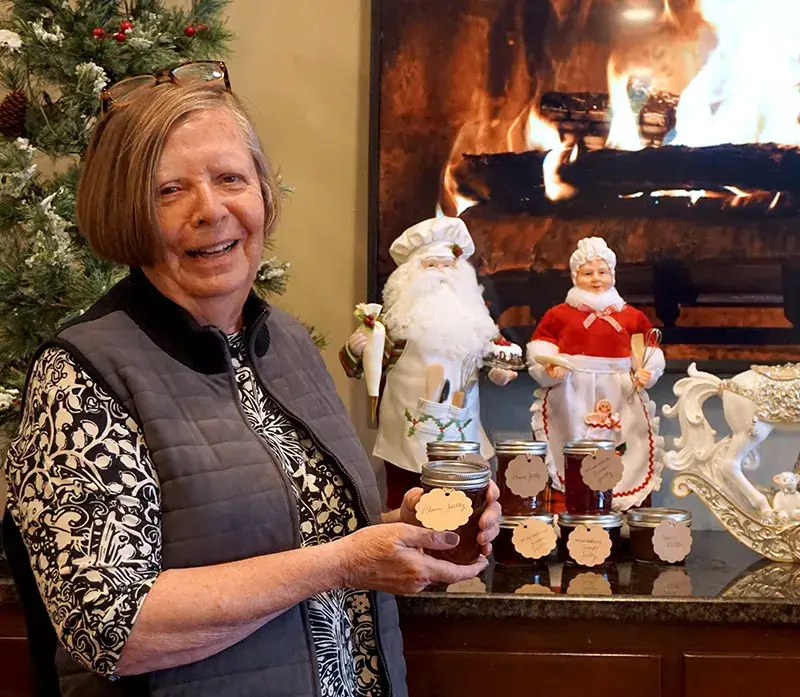A woman selling homemade jelly